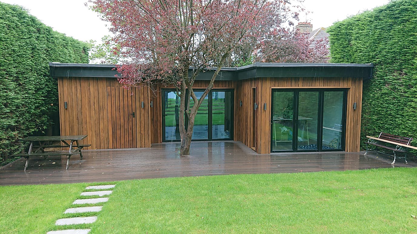 Garden studio wrapped around an existing tree, approved by Sutton Council